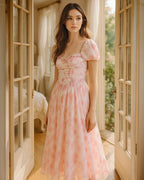 Dear Georgina Cecily Dress – romantic pink floral puff sleeve midi dress with lace heart-shaped bodice, styled indoors with soft natural light, from the English Garden Party collection.