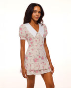 Dear Georgina Eloise Mini Dress – side view of pink rose print puff sleeve dress with oversized white collar, pearl buttons, and ruffled hem, from the English Garden Party collection.