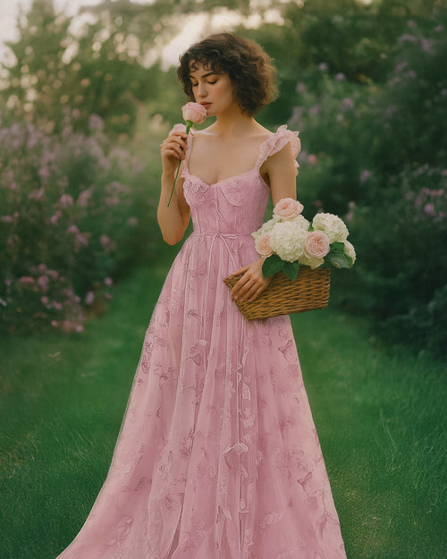 Dear Georgina Georgina Dress in Pink – embroidered tulle gown with ruffled straps, sweetheart neckline, and corset bodice, styled in a flower garden with a wicker basket of roses, from the English Garden Party collection.